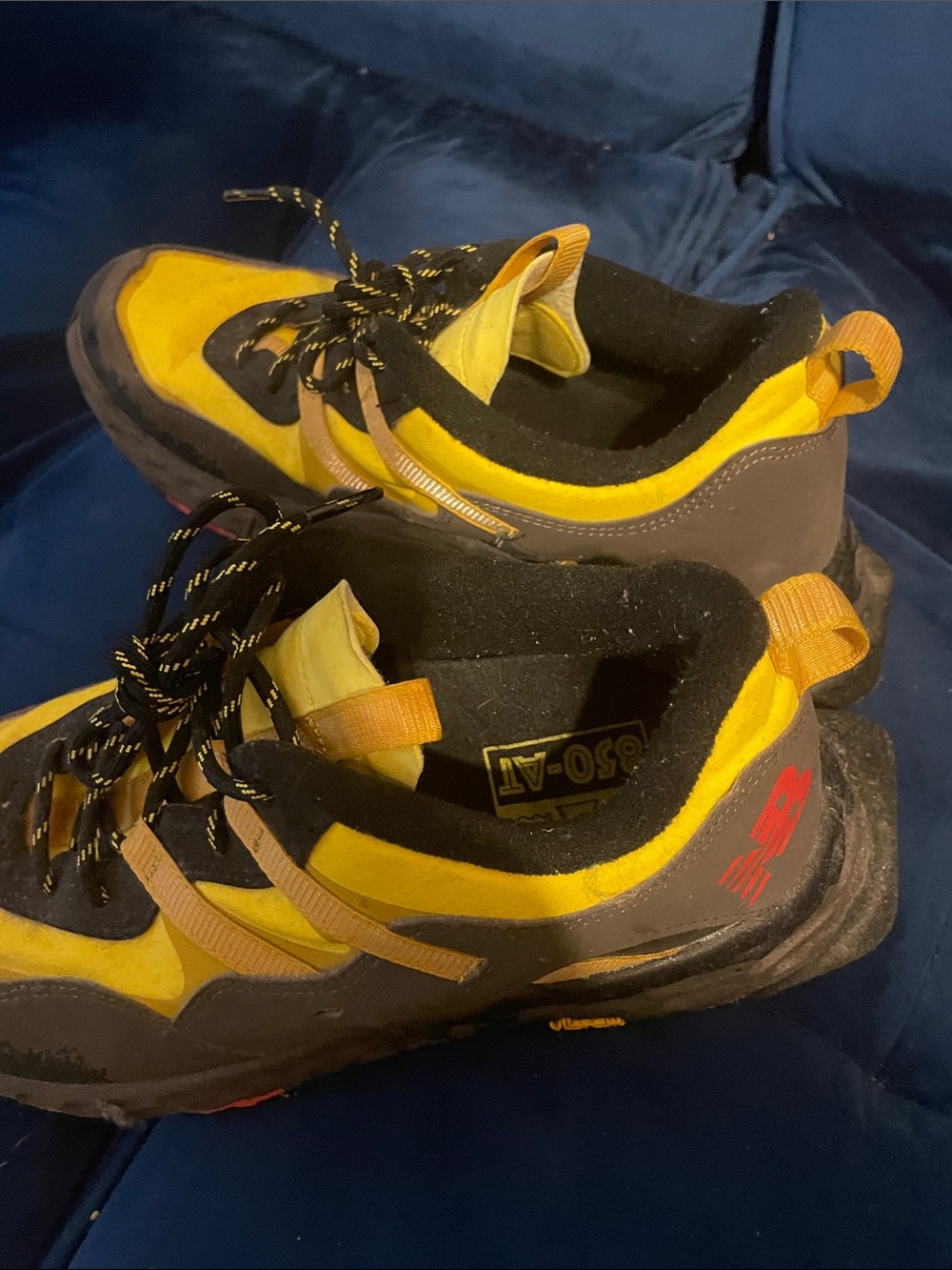 New Balance Yellow and Brown Trail Shoes with Red Logo